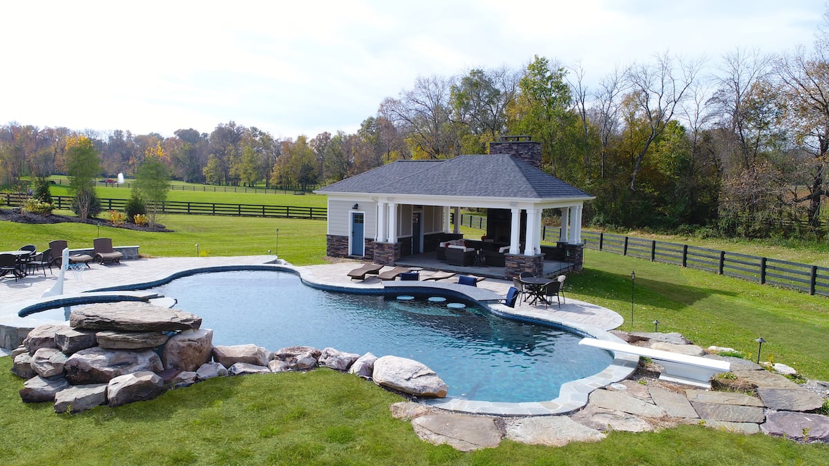 Custom covered pool house and pool with patio