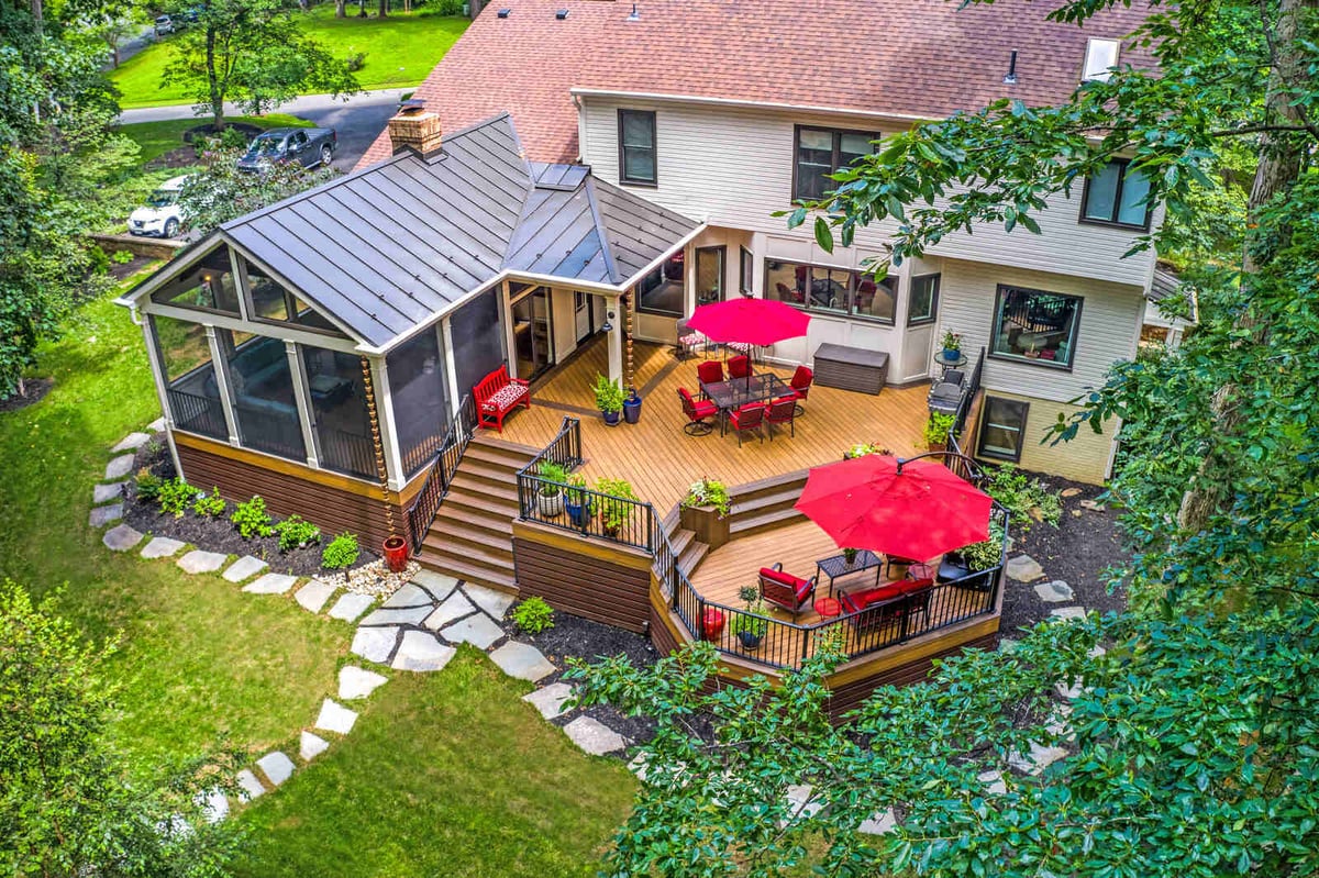 multi-level-deck-with-patio-furniture-and-screened-in-patio-1
